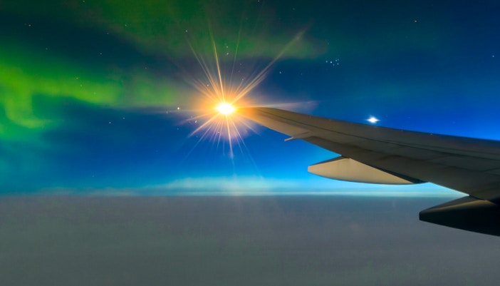 northern lights from airplane window