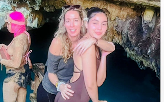 Tourists exploring a cave during a 3-hour panoramic tour in Punta Cana with an artisan market.