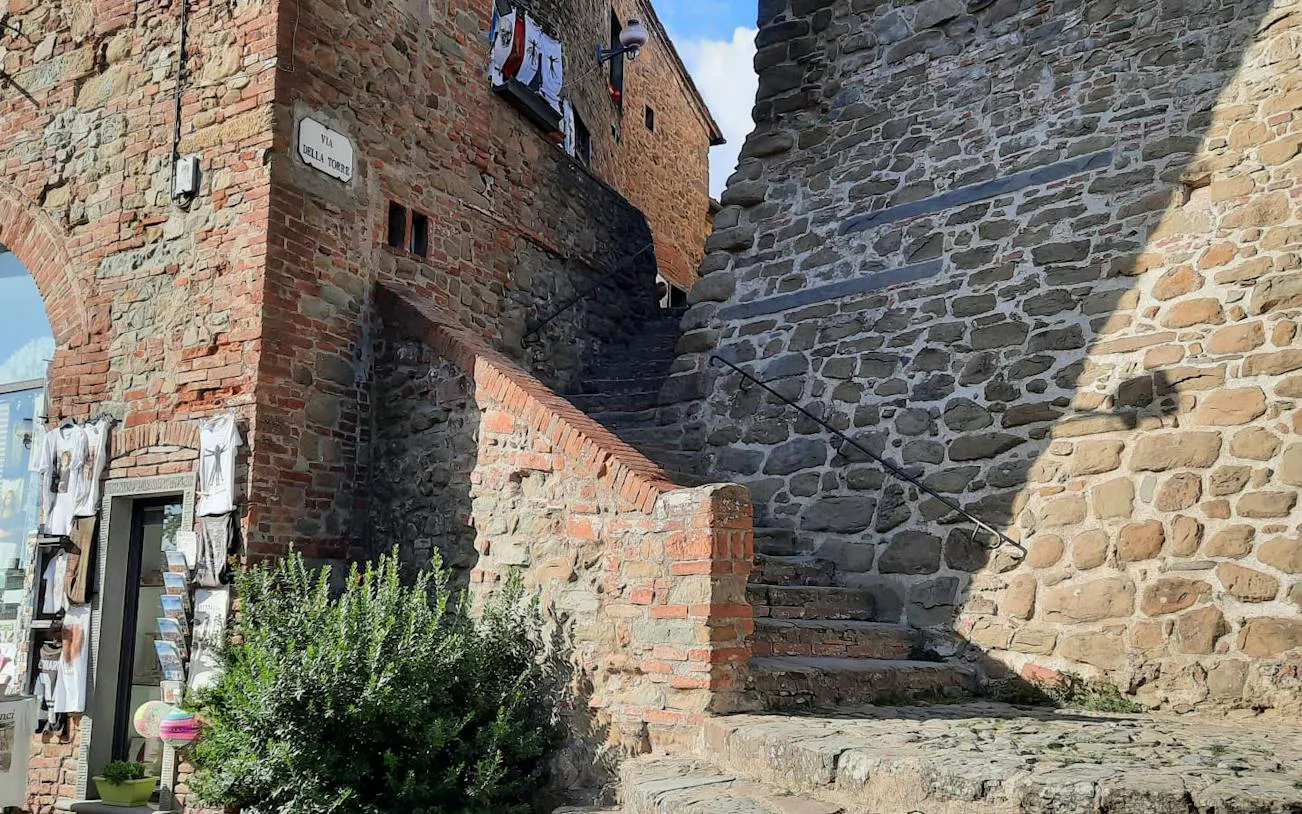 Stone staircase in Vinci, Italy, leading to historic buildings on the Leonardo da Vinci Hometown Tour.