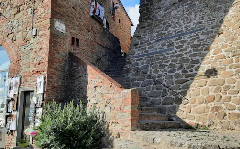 Stone staircase in Vinci, Italy, leading to historic buildings on the Leonardo da Vinci Hometown Tour.