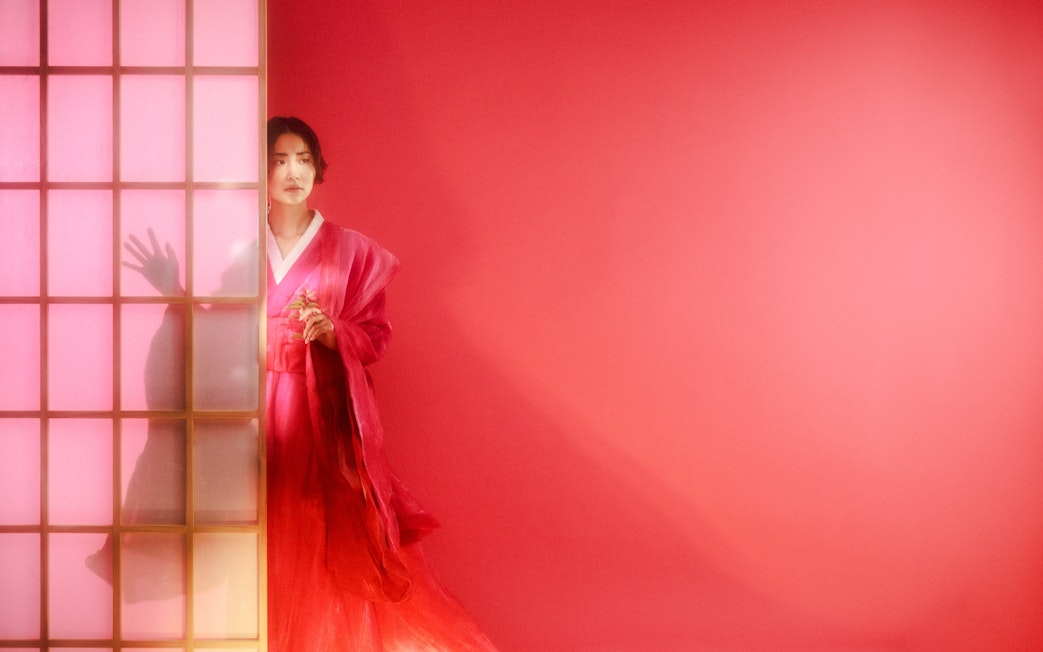 Performer in traditional attire during Madama Butterfly in Sydney.