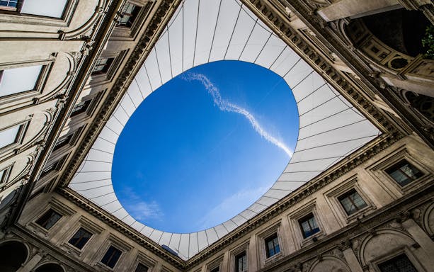 Courtyard view of the National Roman Museum - Palazzo Massimo with open sky.