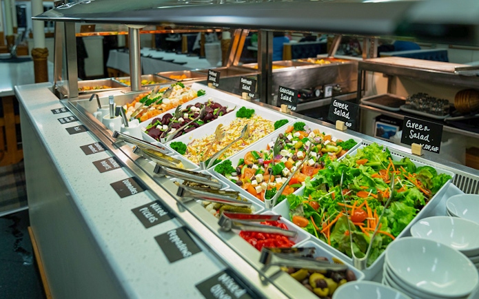Buffet with assorted salads on Overnight Milford Sound Cruise.