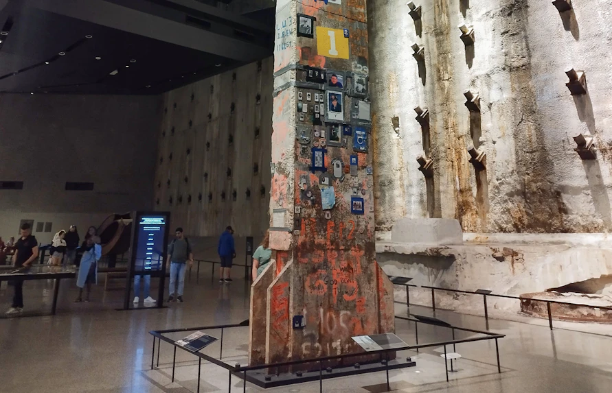 Steel column with memorial tributes at 9/11 Memorial & Museum, New York City.