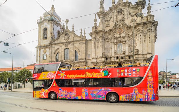 HOHO tour bus in front of Igreja do Carmo, Porto, Portugal.