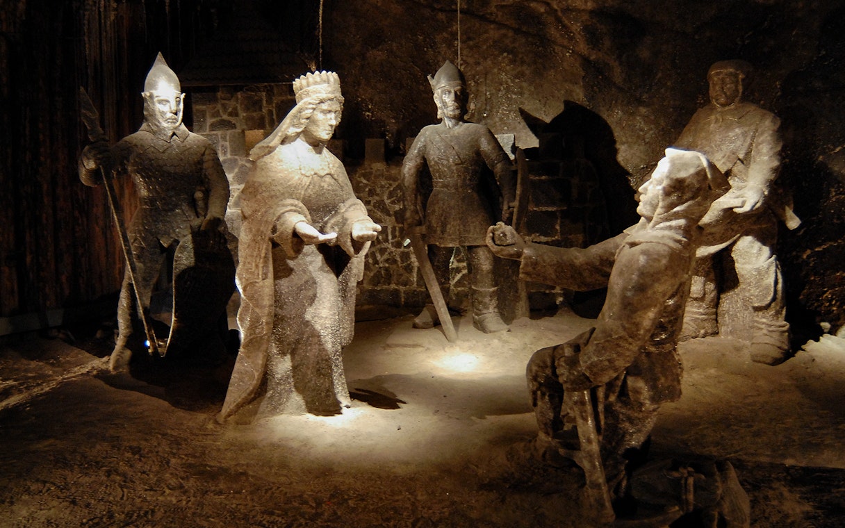 Salt sculptures depicting historical figures in Wieliczka Salt Mine, Poland.