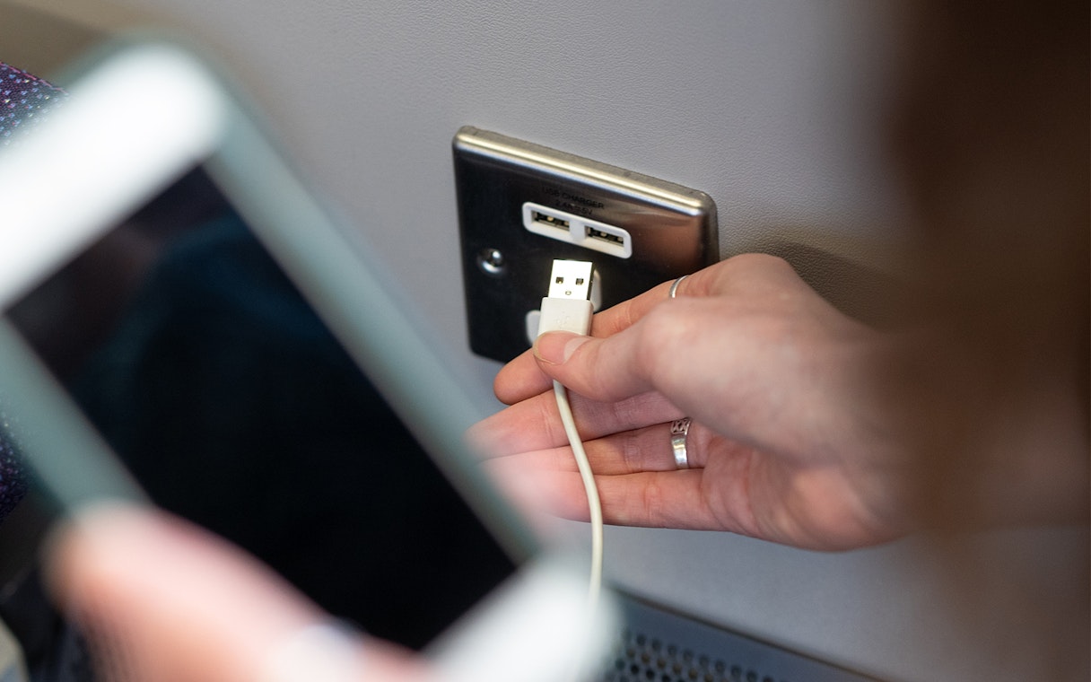 USB charging socket on Heathrow Express train.