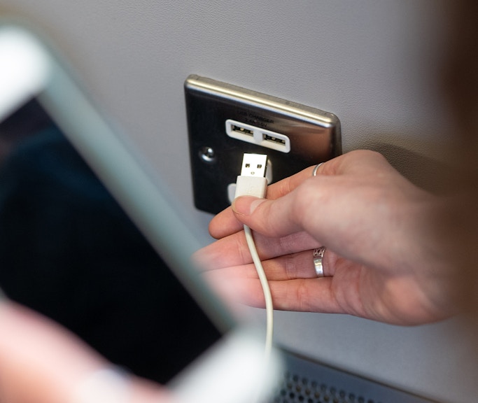 USB charging socket on Heathrow Express train.