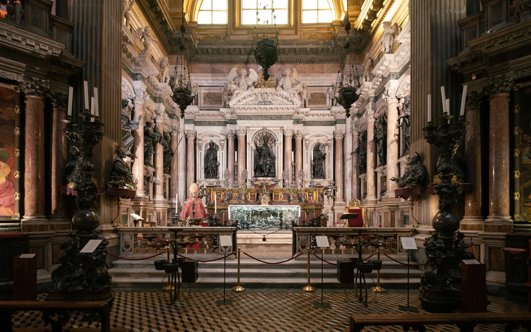 Royal Chapel of the Treasure of San Gennaro interior with ornate altar and sculptures.