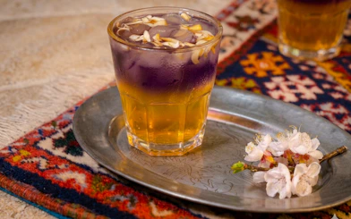 Traditional Moroccan tea on a silver tray with flowers, Marrakesh.