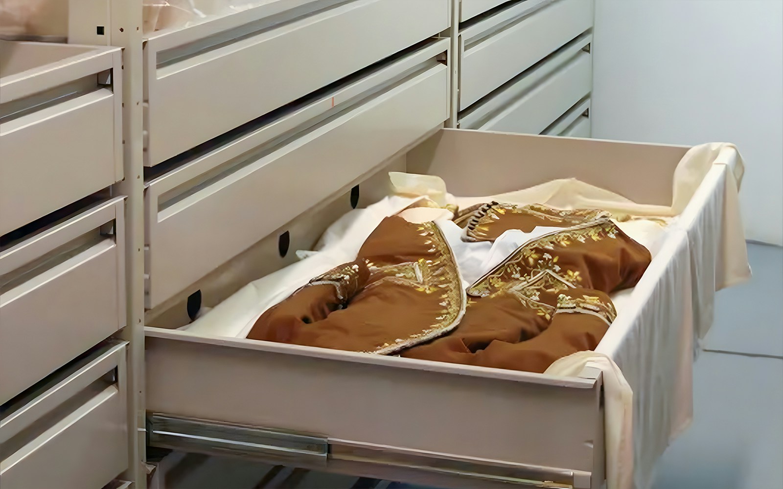 Costume storage at Palais Galliera exhibit in Paris.