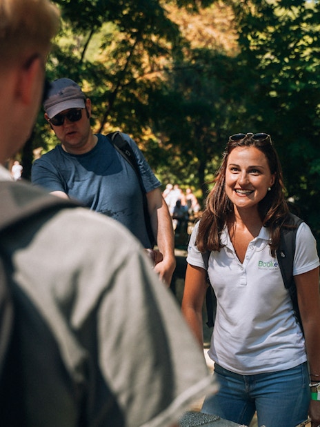 Tour guide leading a group at Krka Waterfalls, Split.