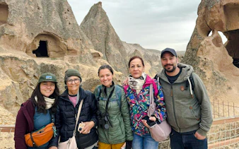 Group of tourists at Ihlara Valley rock formations, Cappadocia Green Tour.
