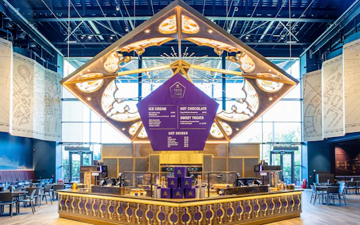 Frog Cafe interior with menu display during Harry Potter London tour.