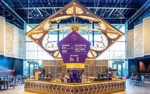 Frog Cafe interior with menu display during Harry Potter London tour.