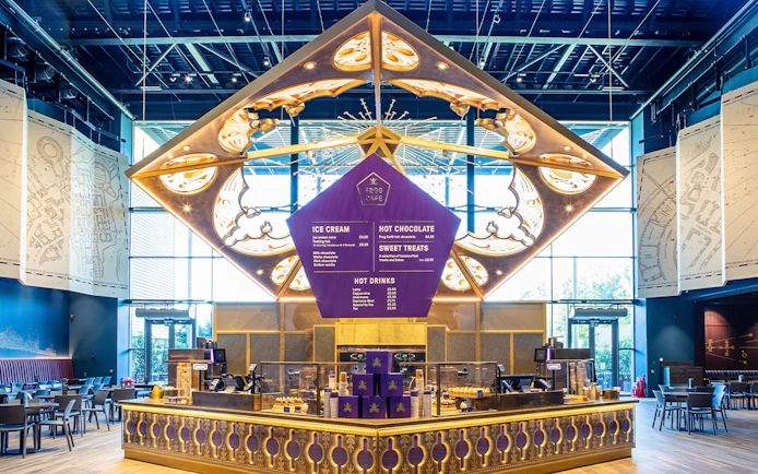 Frog Cafe interior with menu display during Harry Potter London tour.
