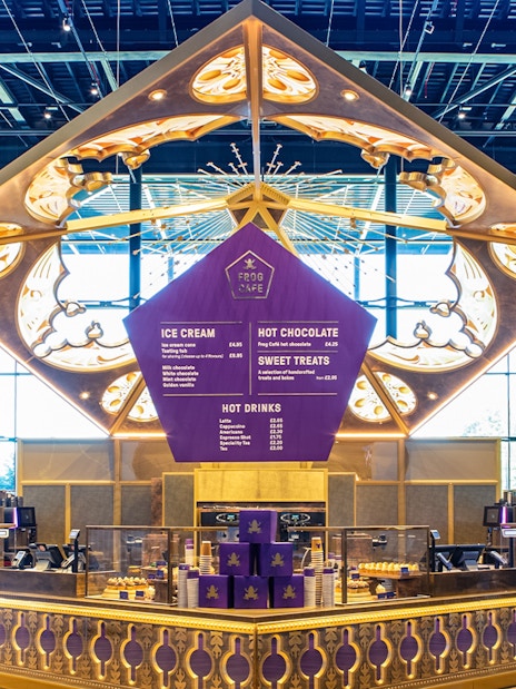 Frog Cafe interior with menu display during Harry Potter London tour.