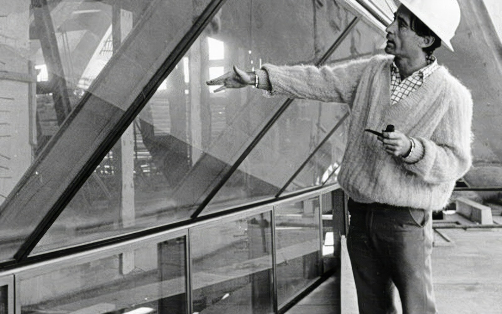 Architect examining Sydney Opera House construction details.