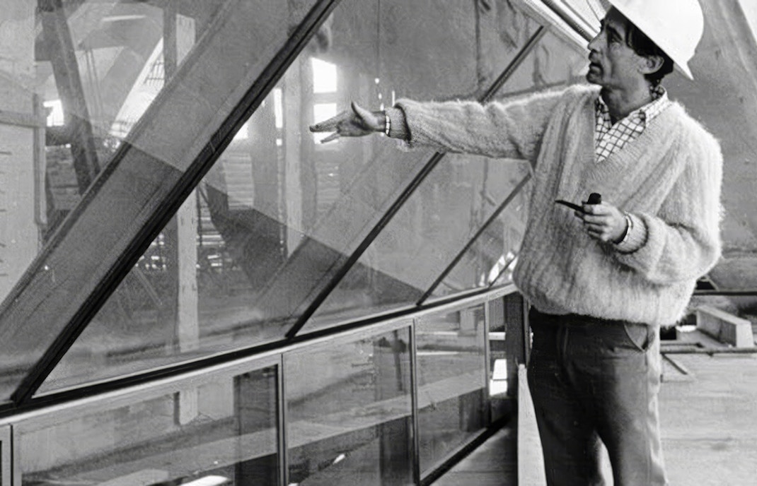 Architect examining Sydney Opera House construction details.