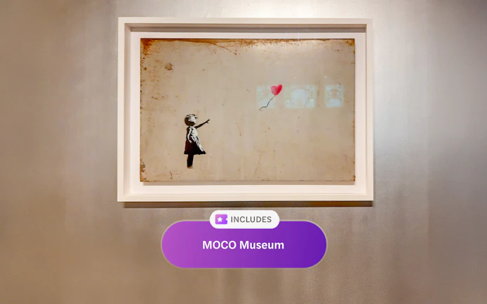 Artwork of a child with a balloon at MOCO Museum, Amsterdam.