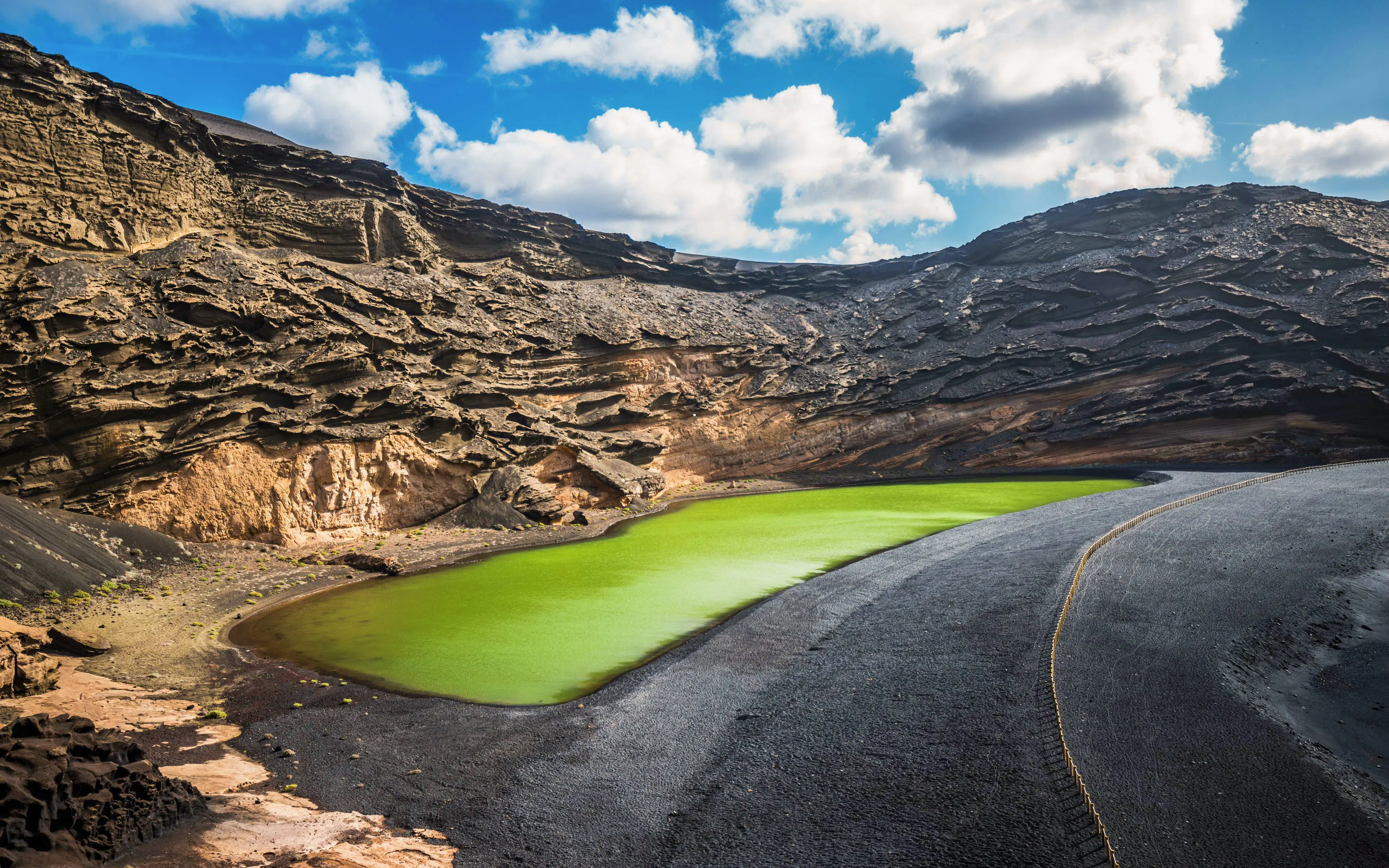 Charco de los Clicos green lagoon with volcanic cliffs, Lanzarote, Canary Islands, Spain.