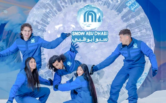 Visitors enjoying Snow Abu Dhabi indoor snow park experience in Abu Dhabi.