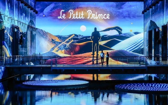 Immersive display of The Little Prince at Bassins des Lumières, Bordeaux.