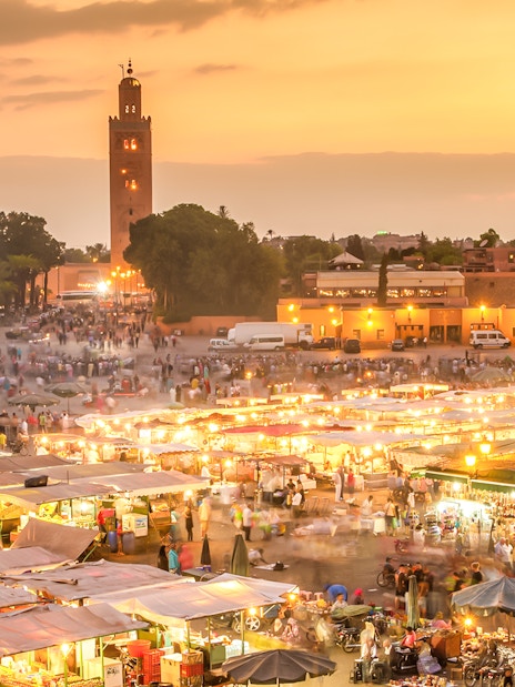 Jema el Fna square in Marrakesh bustling with night market activity.