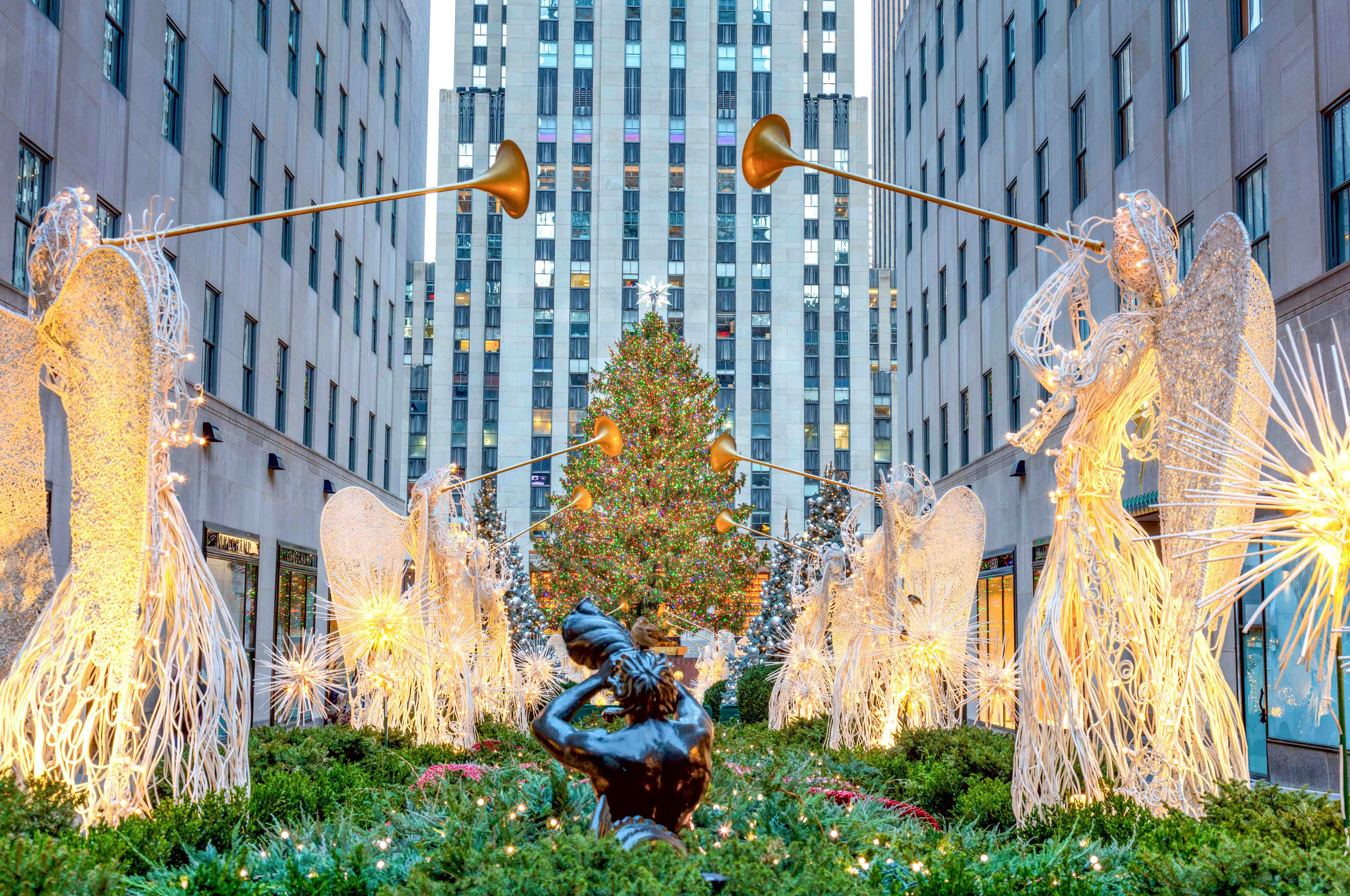 Rockefeller Center Christmas Tree illuminated at night in New York City.