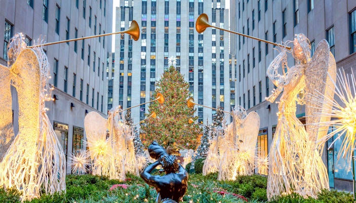 Rockefeller Center Christmas Tree illuminated at night in New York City.