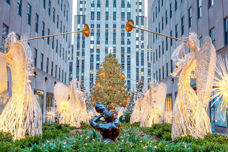 Rockefeller Center Christmas Tree illuminated at night in New York City.