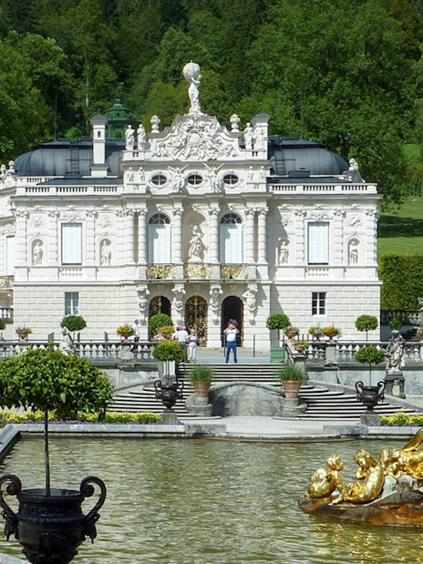 Linderhof Palace with gardens and fountain, part of a day trip from Munich.