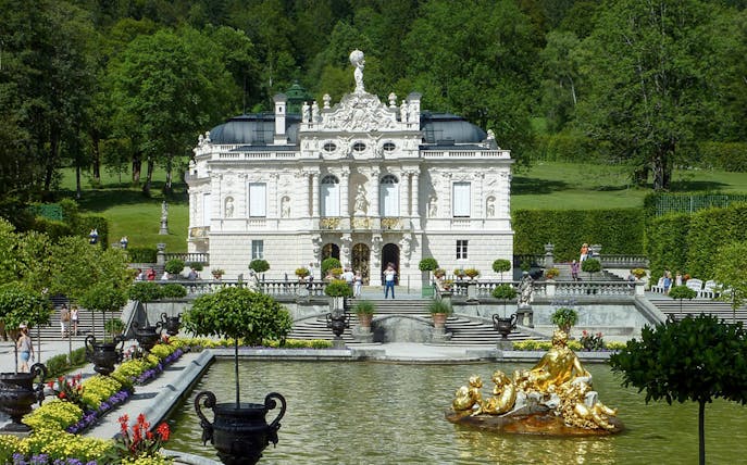 Linderhof Palace with gardens and fountain, part of a day trip from Munich.