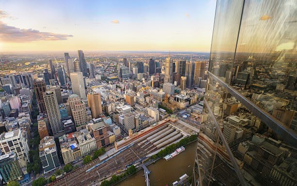 Aerial view of Melbourne cityscape from the Skydeck with reflections on glass.