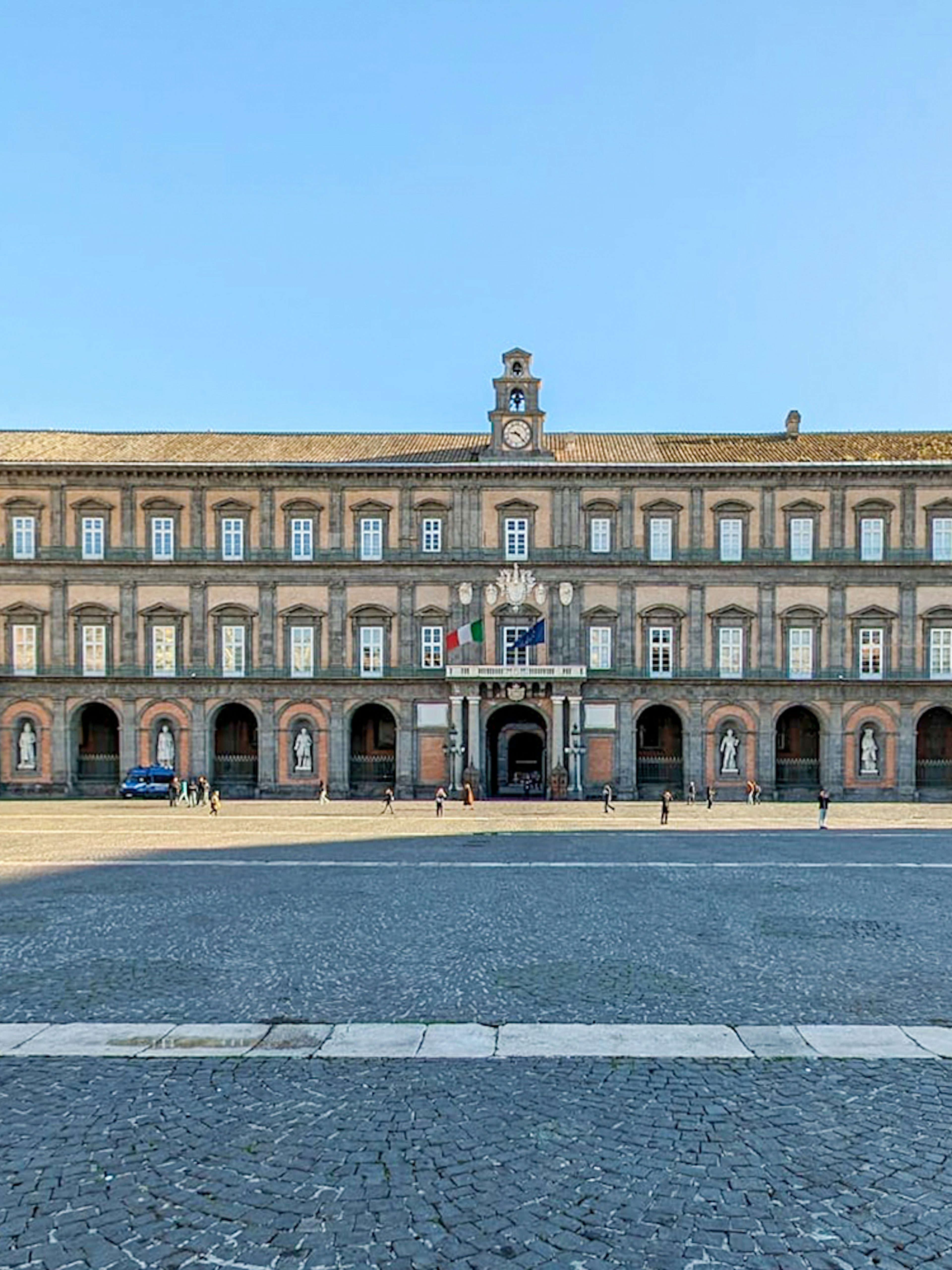 Royal Palace facade in Naples monumental district, Italy.