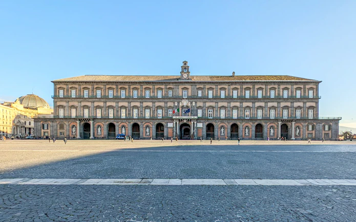 Royal Palace facade in Naples monumental district, Italy.