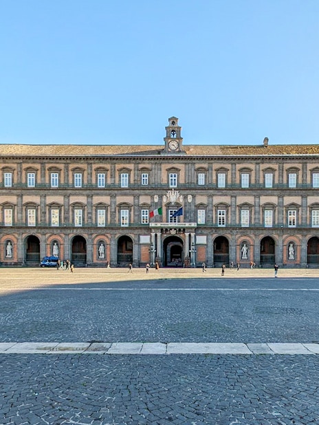 Royal Palace facade in Naples monumental district, Italy.