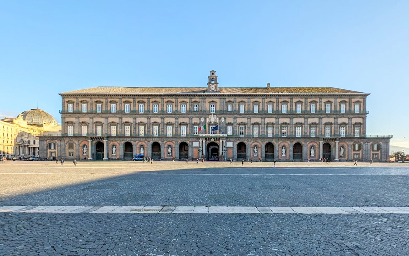 Royal Palace facade in Naples monumental district, Italy.