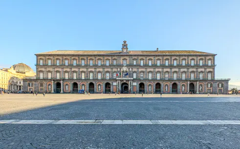 Royal Palace facade in Naples monumental district, Italy.