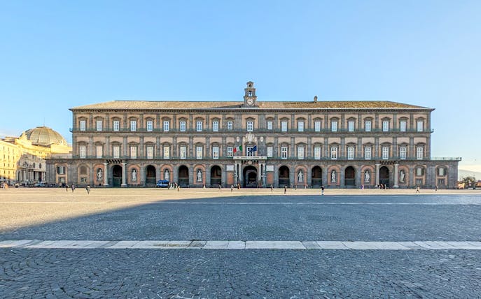Royal Palace facade in Naples monumental district, Italy.