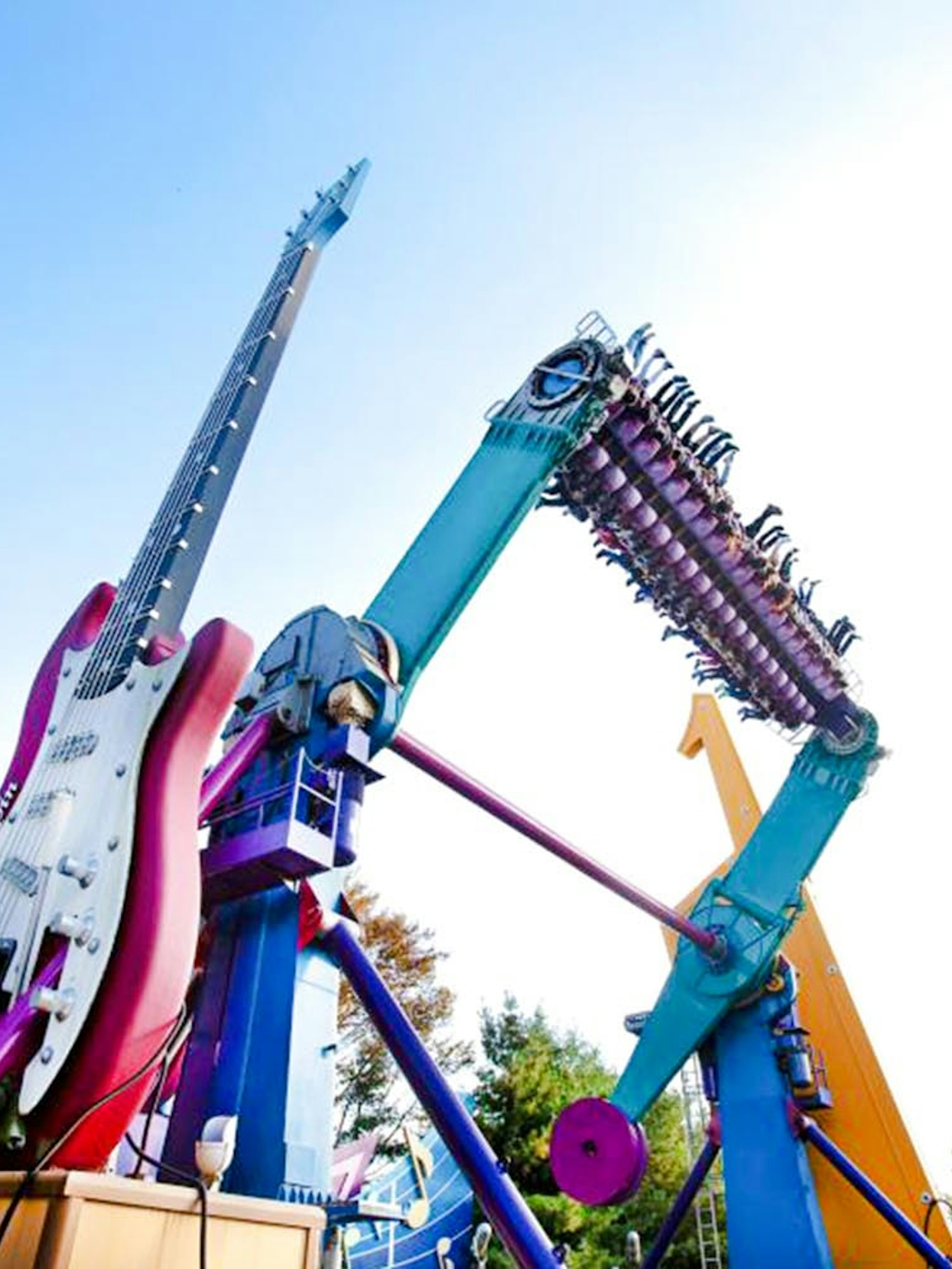 Everland Theme Park ride with giant guitar and rotating seats.