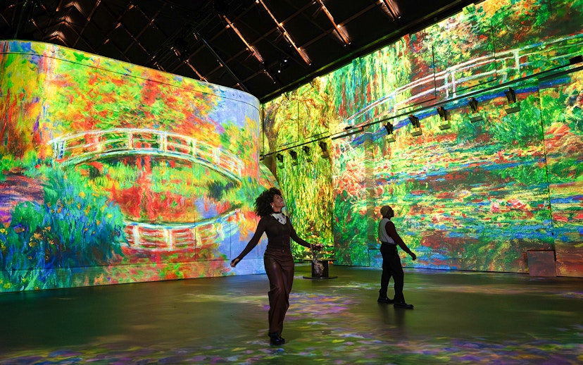 Immersive Monet art projections at Fabrique des Lumières exhibition.