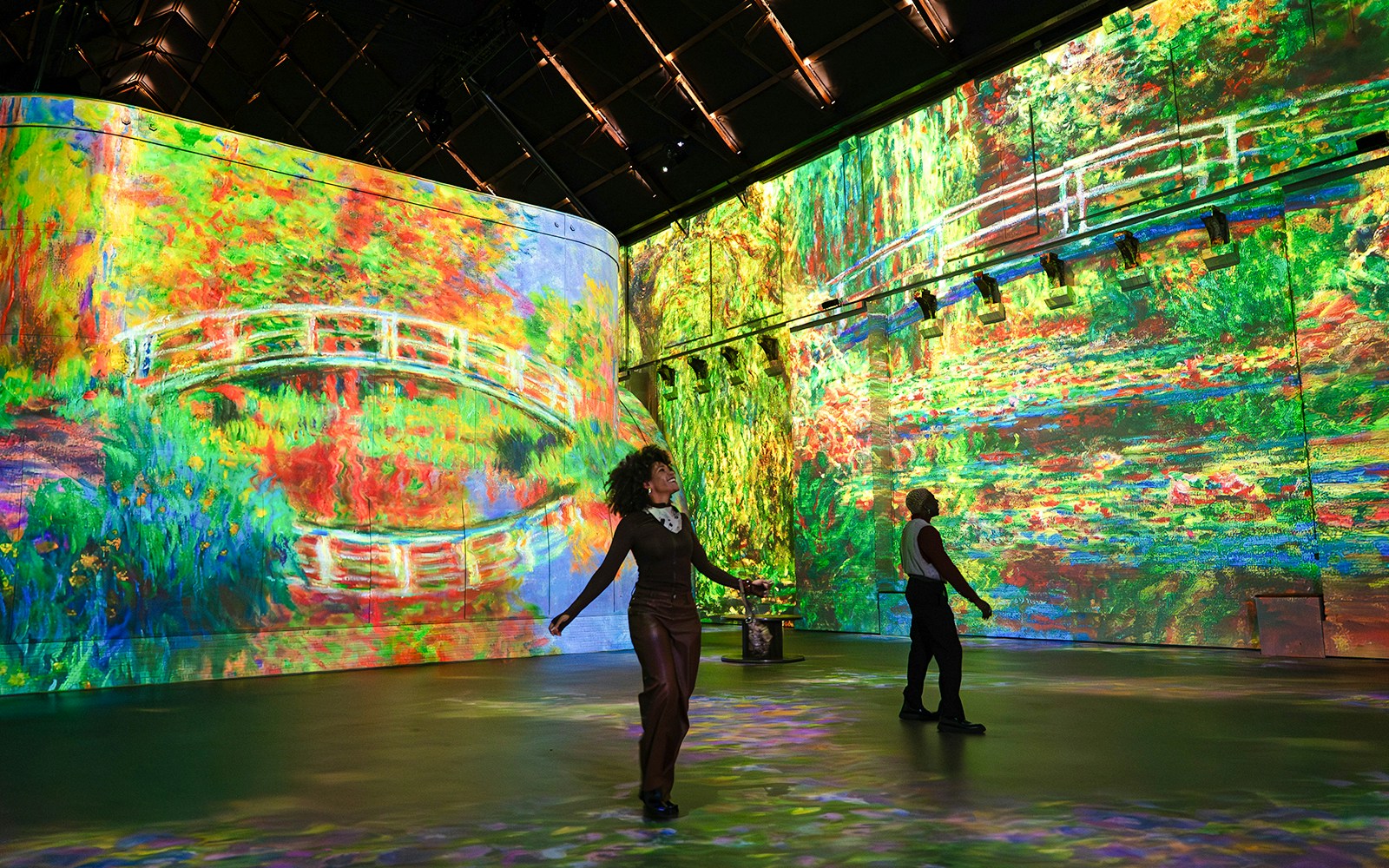 Immersive Monet art projections at Fabrique des Lumières exhibition.