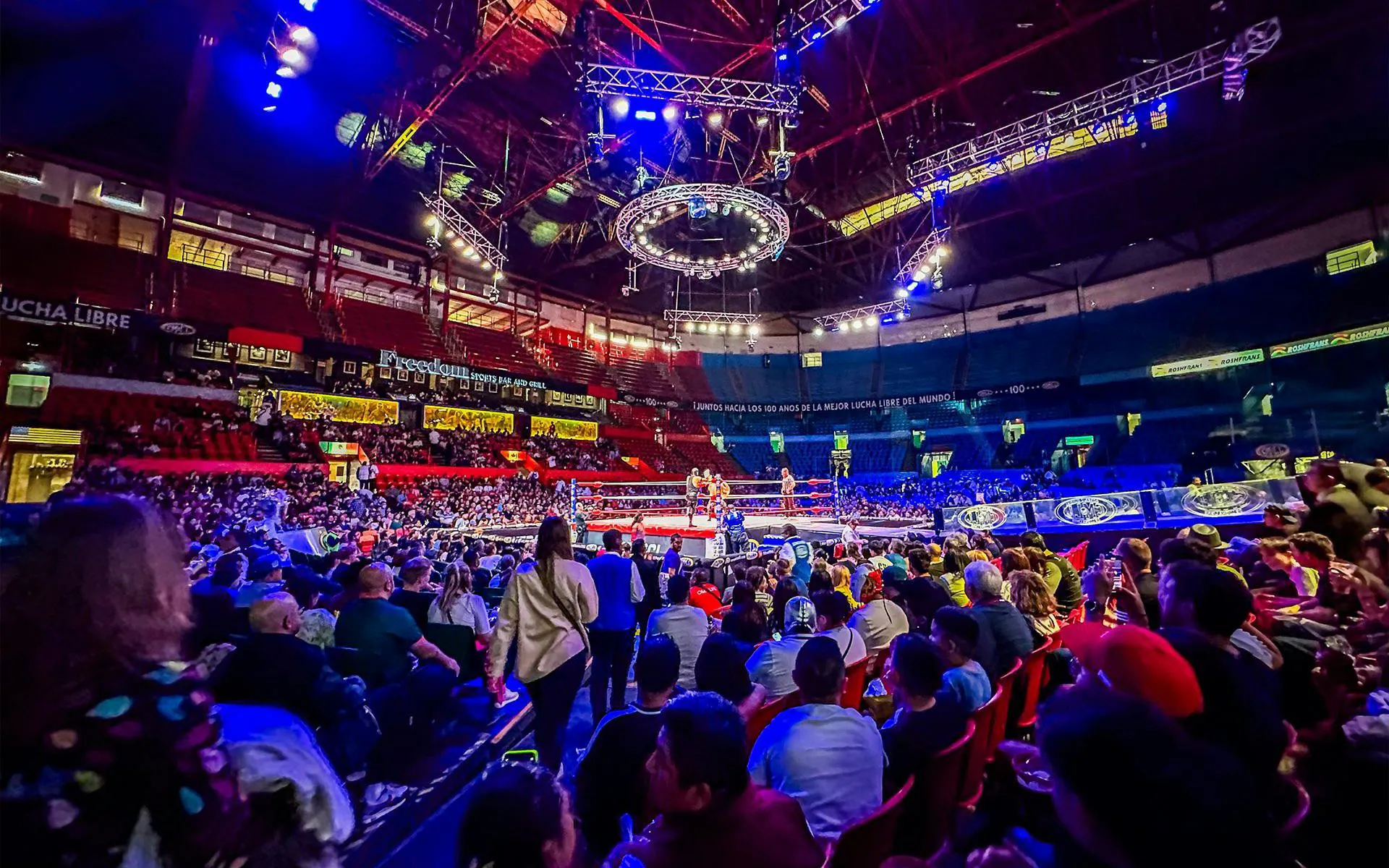 Crowd watching a Lucha Libre wrestling match at Arena Mexico.