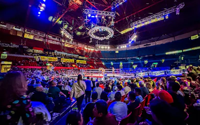 Crowd watching a Lucha Libre wrestling match at Arena Mexico.