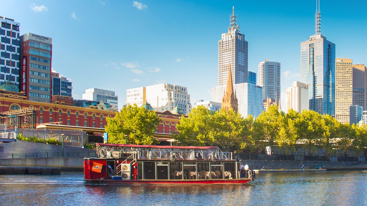 Yarra River cruise brunch with Melbourne skyline in the background.