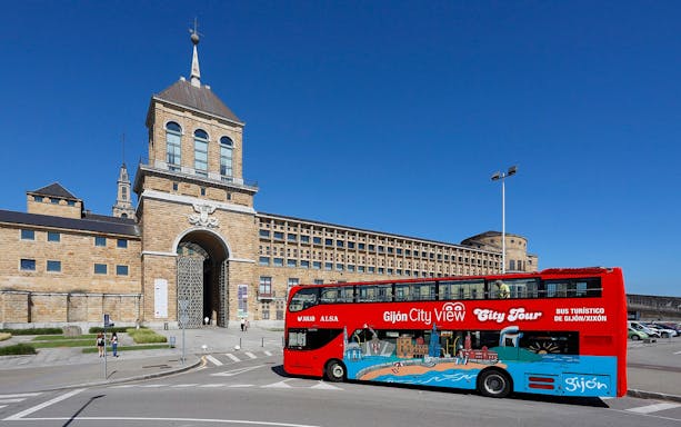 Gijon Hop on Hop off bus in front of the Universidad Laboral de Gijón