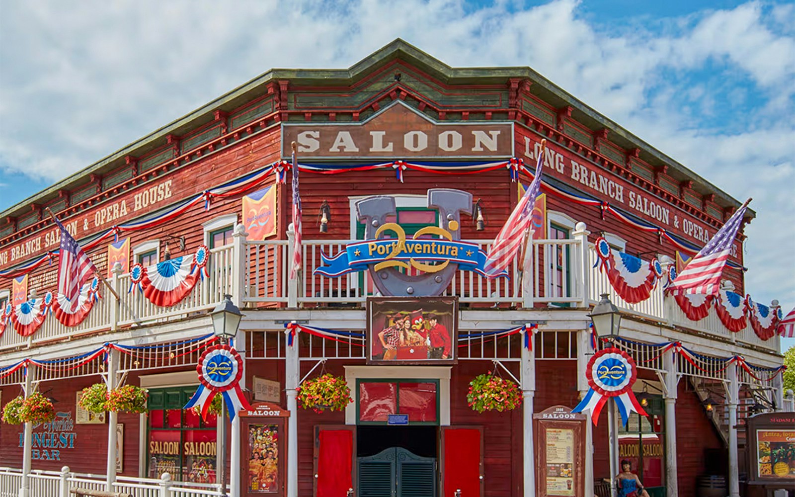PortAventura Park Wild West saloon with flags and decorations.