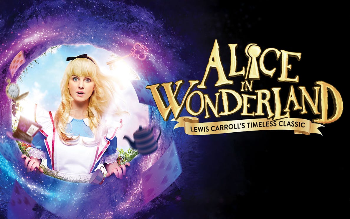 Alice in Wonderland stage show with actors in vibrant costumes on a whimsical set.
