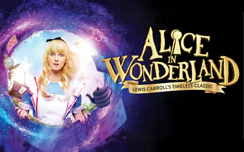 Alice in Wonderland stage show with vibrant costumes and whimsical set design.